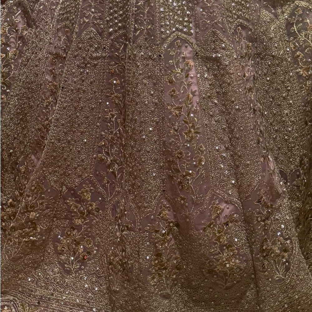 Elegant Embroidered light purple netted gown